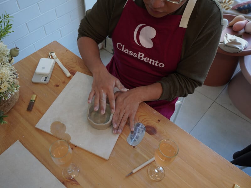 Man hand building clay